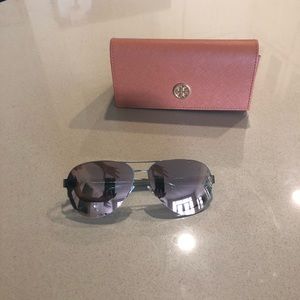 Tory Burch sunglasses.